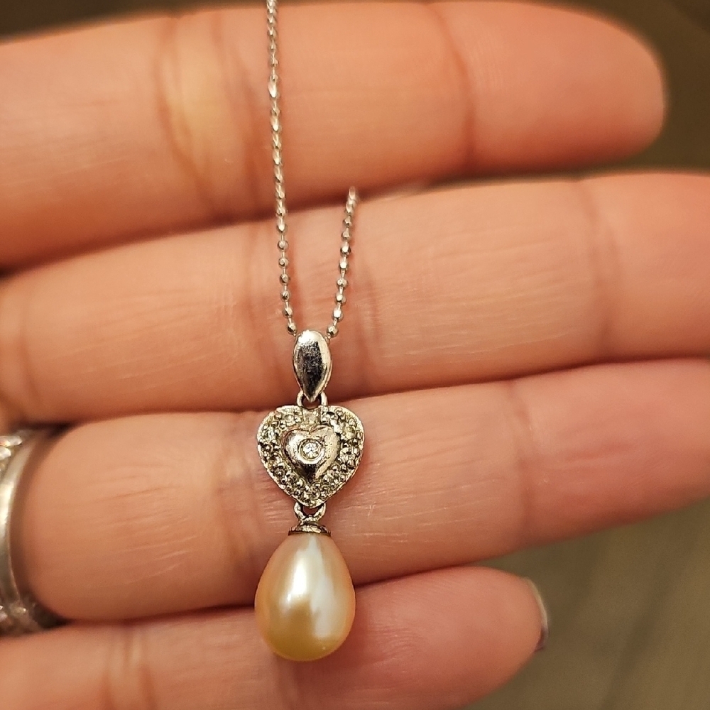 Elegant Silver and Pearl Heart Pendant Necklace